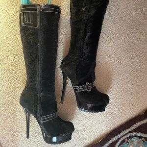 High heeled black boots